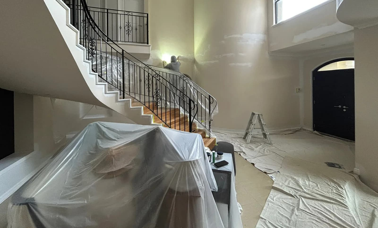 Entry and stair void repaint — before