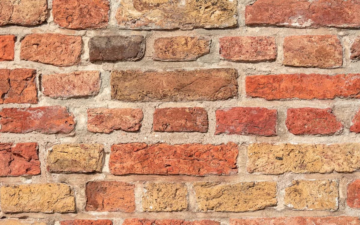 Face brickwork with visible mortar joints
