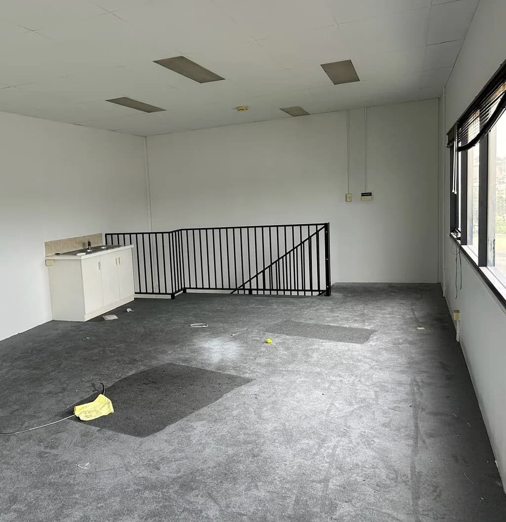 A commercial office suite in Perth after repainting by CREST, walls taken from yellowed cream to clean white