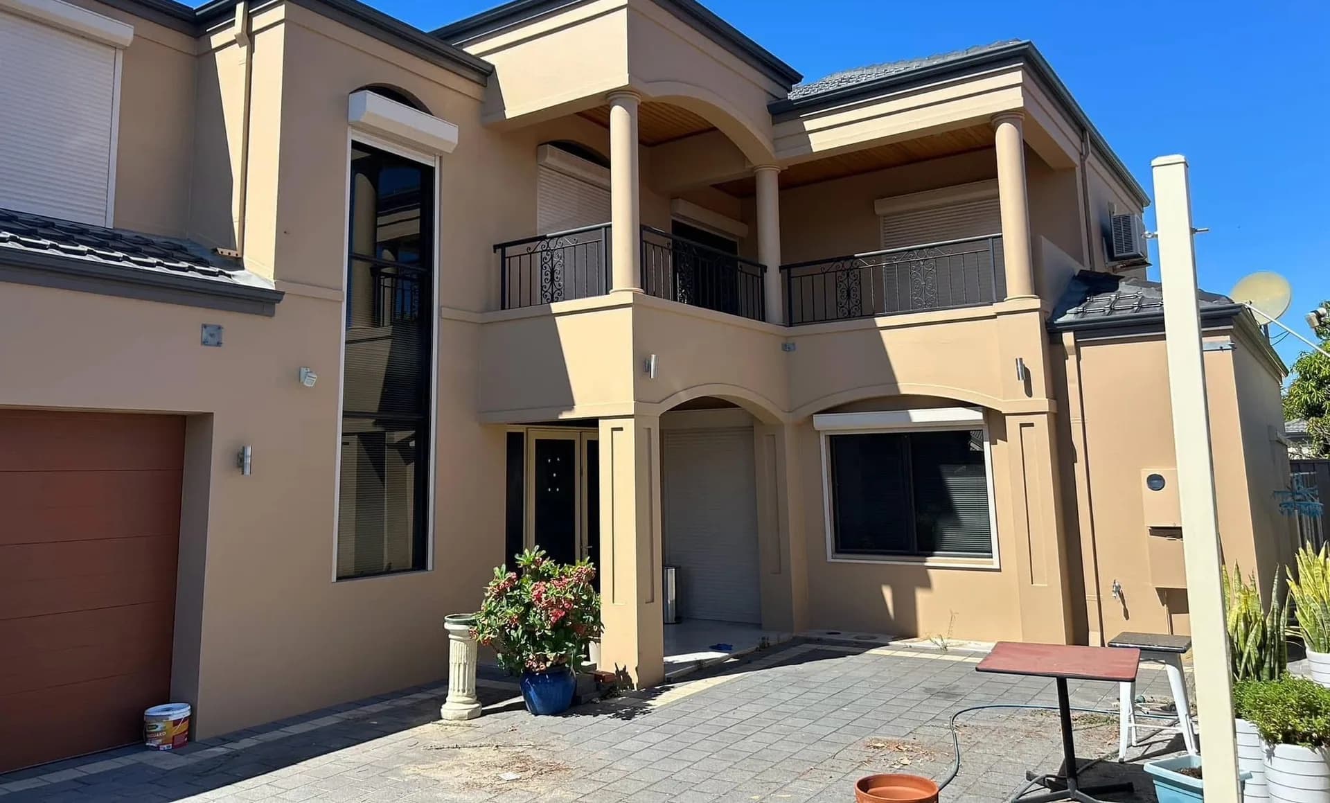 a rendered two-storey Perth home, before and after repainting — after