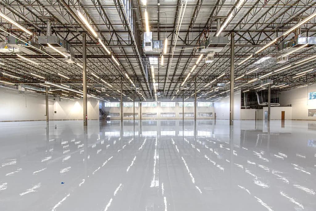 A large industrial floor under a high-gloss protective coating